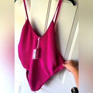 Good American fuchsia and gold swimsuit
